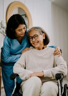 Compassionate caregivers assisting elderly residents at Elite Care Assisted Living Facility in Lakeland, Florida.