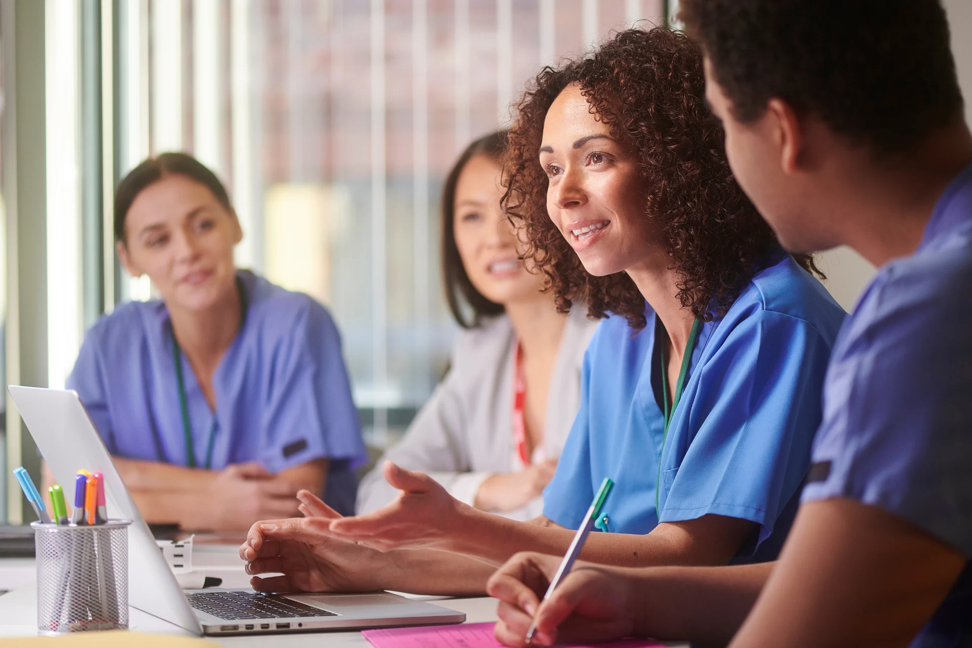 Hospice team coordinating care with medical providers